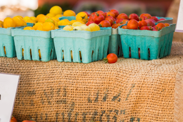 cherry tomatoes on display at farmers market