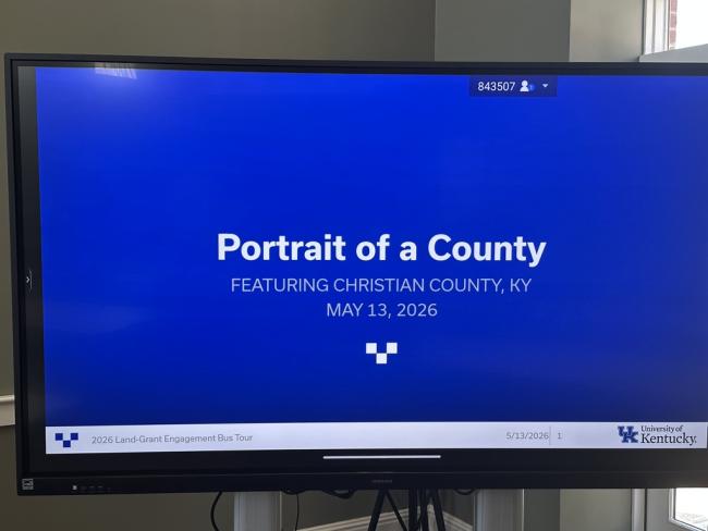 screen with a slide displayed reading Portrait of a County Featuring Christian County, KY May 13, 2026