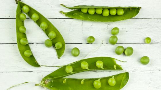 pea pods on white table