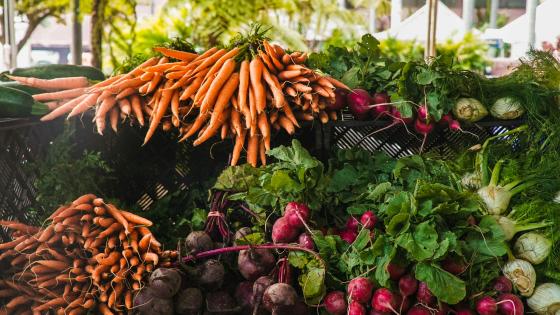 a farmers market display with fresh produce