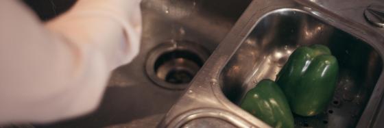 washing produce in sink